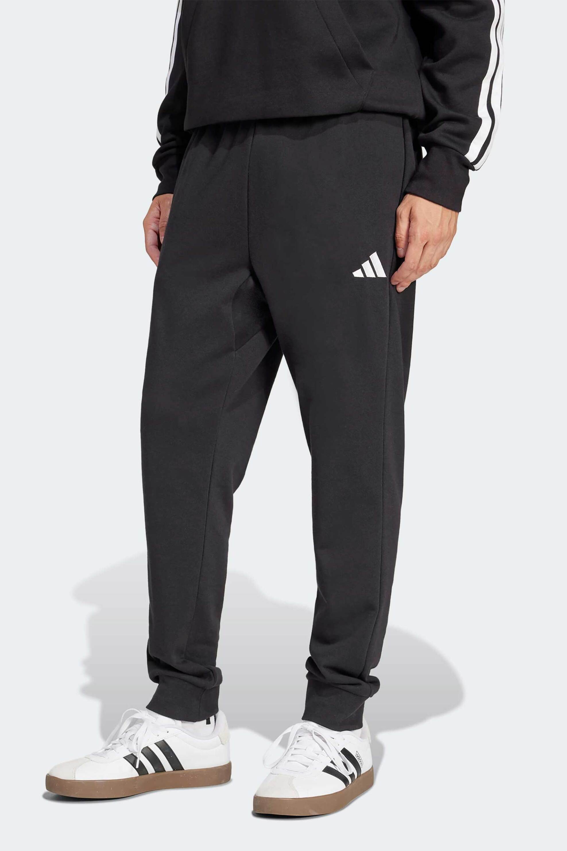 Adidas ανδρικό παντελόνι φόρμας Regular Fit "Essentials Feel Cozy French Terry" - JE3854 Μαύρο Adidas ανδρικό παντελόνι φόρμας Regular Fit "Essentials Feel Cozy French Terry" - JE3854 Μαύρο